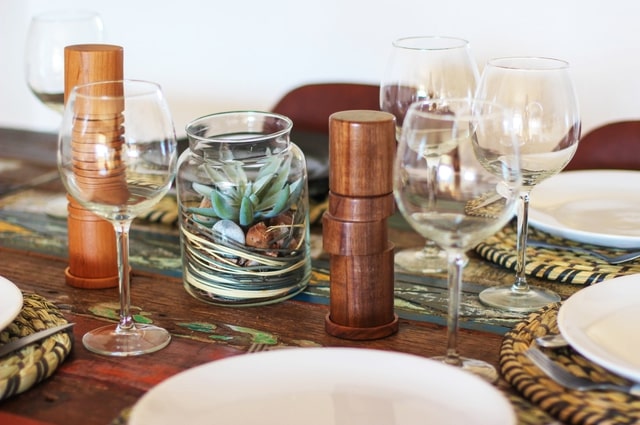 Get Registry Results: Tips to Enhance Your Gift Registry Service, a table set with wine glasses, plates, and salt and pepper shakers.