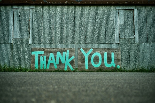 Make a Big Impact with Gift Registry in 2021, a building with the words 'thank you' painted on it.