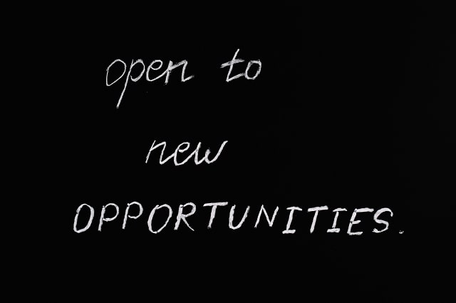 A chalkboard with writing on it that says open to new opportunities