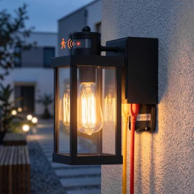 17 Stories Motion Sensor & Dusk-to-Dawn Outdoor Wall Light with GFCI Outlet,12 Matte Black | Wayfair