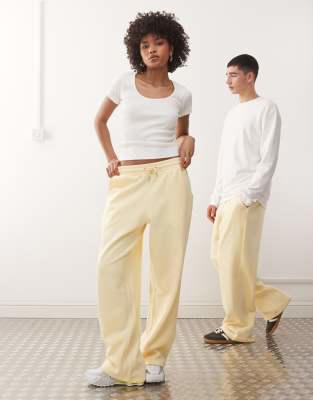 COLLUSION Unisex relaxed trackies in butter yellow | ASOS