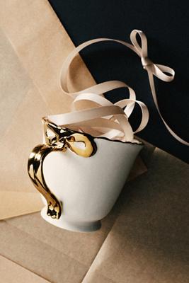 Benedita Bow Stoneware Gold Mug | Anthropologie