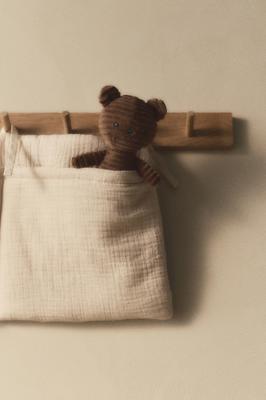 Light beige Wall-hanging muslin storage at H&M Home | H&M GB