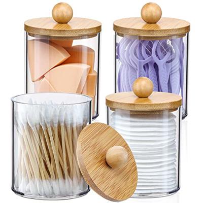 4 Pack Qtip Holder Dispenser with Bamboo Lids - 10 oz Clear Plastic Apothecary Jar Containers for Vanity Makeup Organizer Storage - Bathroom Accessori
