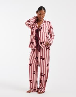Loungeable Petite supersoft jersey tie front shirt and trouser pyjama set in bow print pink stripe | ASOS